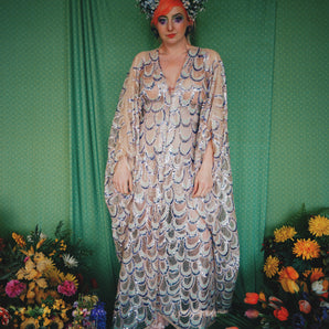 Snowdrops, lilacs, mermaids and horseshoes sequin kaftan gown