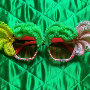 Dame Edna Yellow and lime feather and pink tinted sunglasses