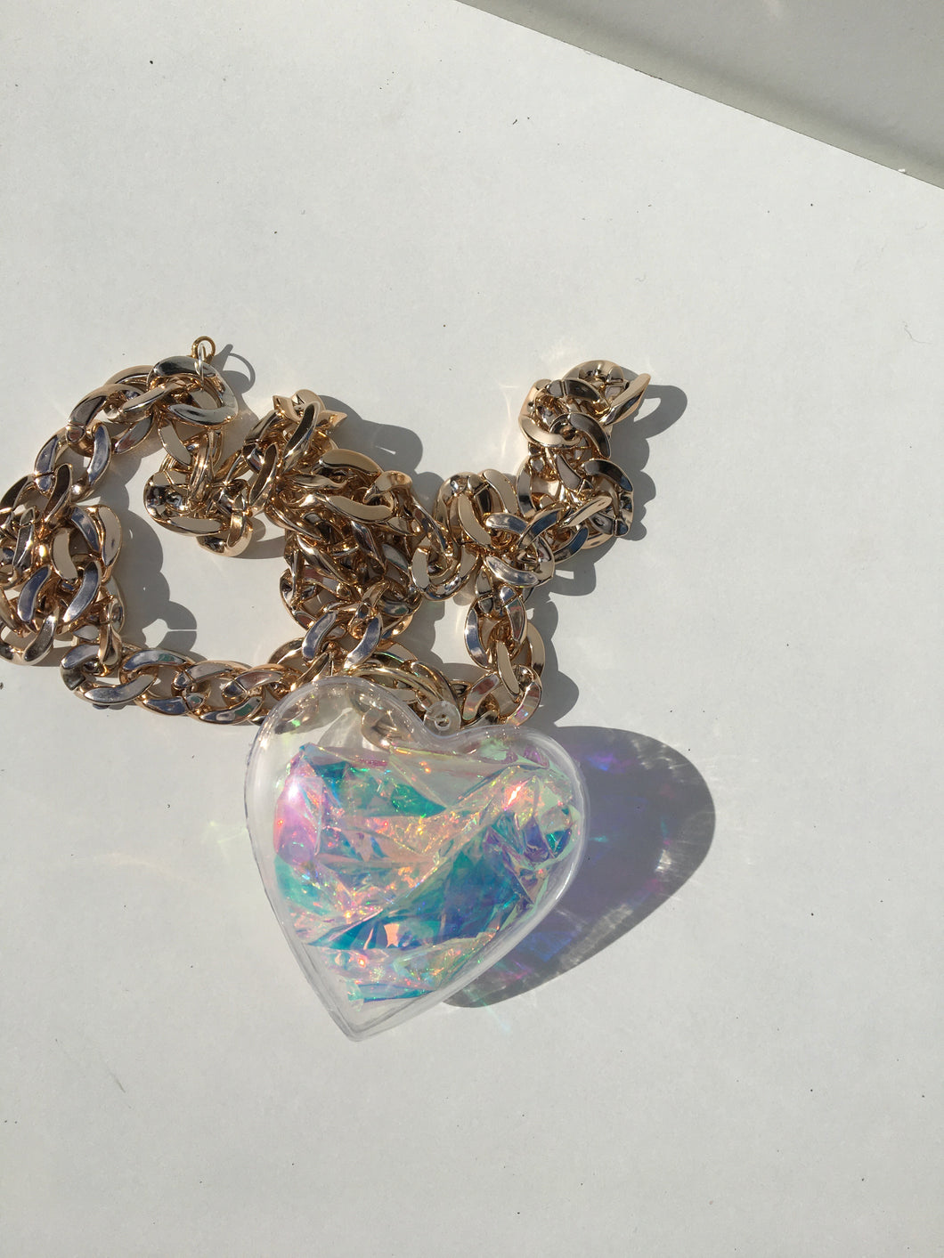 iridescent filled 3d love heart necklace on chunky silver chain