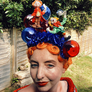 Clowns, ruffles and juggling balls Headpiece
